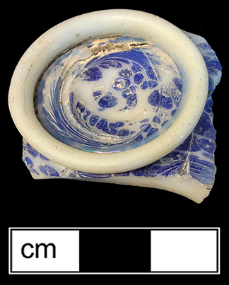 Blue prunt, probably from winged serpent of dragon flute glass.  Facon de Venise glass.  Similar example to right  made in the Netherlands between 1675 and 1700.  Similar examples found at St. Mary’s City in a number of 17th-century contexts and at Smith’s St. Leonard (18CV91), dated c. 1711-1754. Test Unit 51, Lot 179. 18CH821